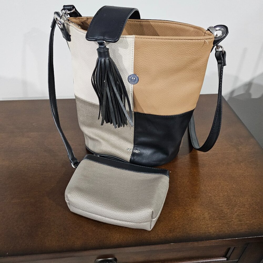 Nine West purse lot of room inside 3 shades of brown has wallet inside